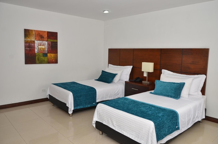 Imagen de la habitación del Hotel Suite Comfort. Foto 11