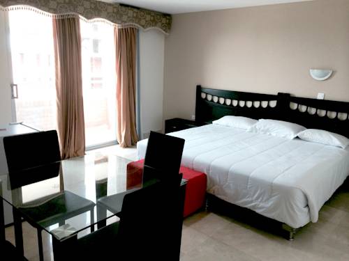 Imagen de la habitación del Hotel Suite Continental. Foto 3