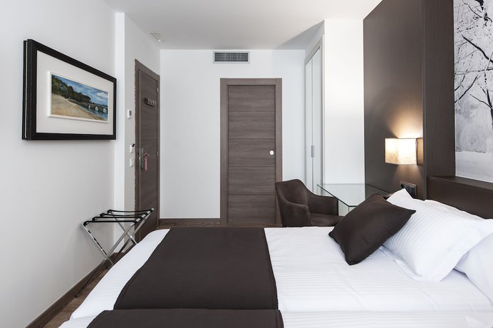 Imagen de la habitación del Hotel Suite Home Sardinero. Foto 10