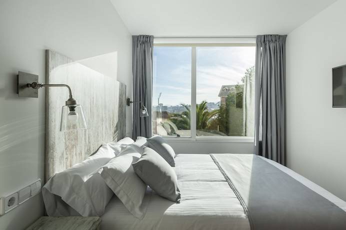 Imagen de la habitación del Hotel Suite Home Sardinero. Foto 11