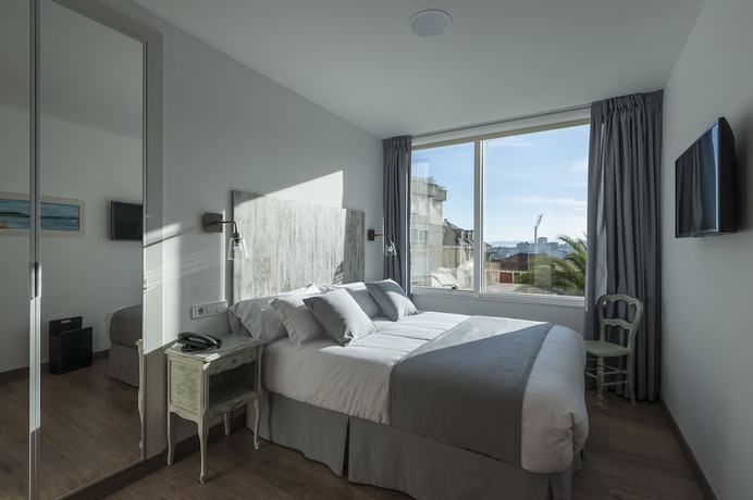 Imagen de la habitación del Hotel Suite Home Sardinero. Foto 17