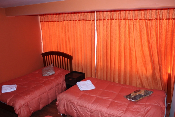 Imagen de la habitación del Hotel Suite Independencia Puno. Foto 7