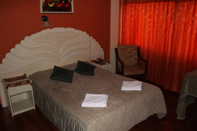 Imagen de la habitación del Hotel Suite Independencia Puno. Foto 8