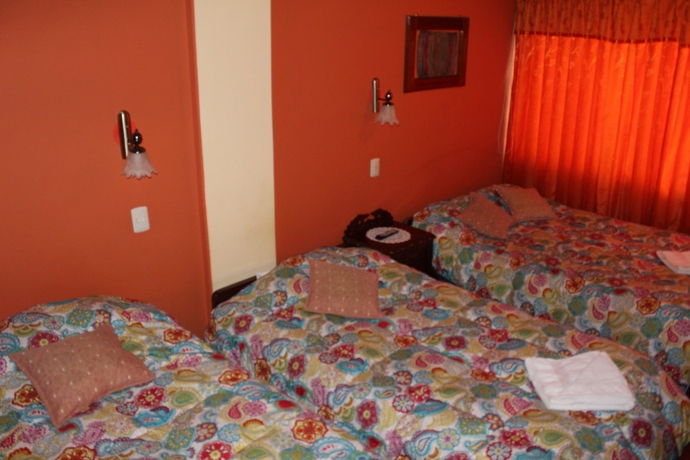 Imagen de la habitación del Hotel Suite Independencia Puno. Foto 9