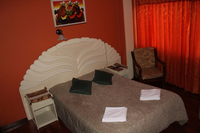 Imagen de la habitación del Hotel Suite Independencia Puno. Foto 10