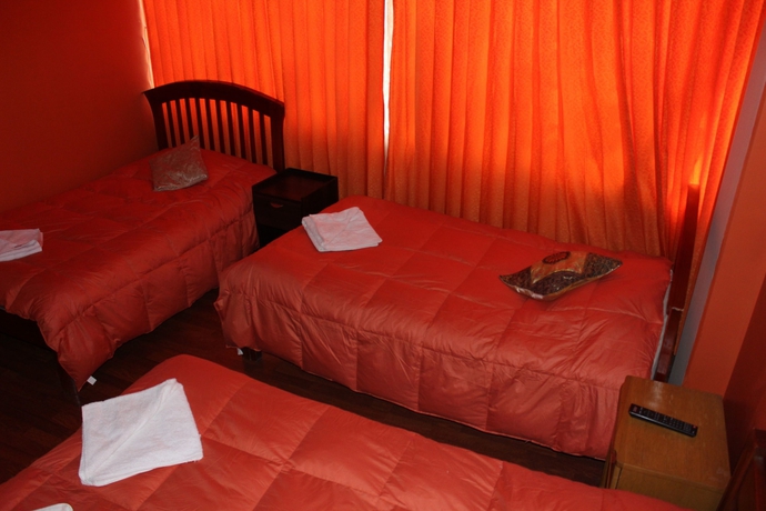 Imagen de la habitación del Hotel Suite Independencia Puno. Foto 11