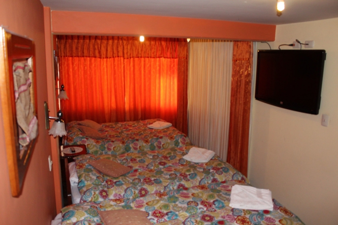 Imagen de la habitación del Hotel Suite Independencia Puno. Foto 12