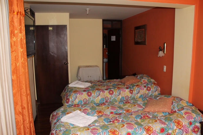 Imagen de la habitación del Hotel Suite Independencia Puno. Foto 13