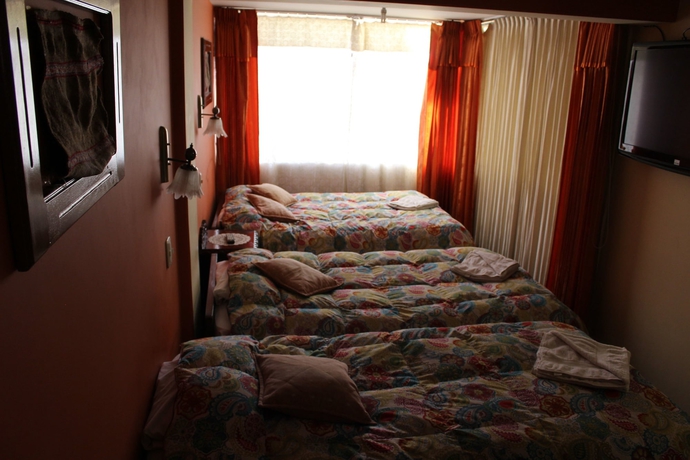 Imagen de la habitación del Hotel Suite Independencia Puno. Foto 14