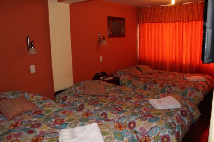 Imagen de la habitación del Hotel Suite Independencia Puno. Foto 15
