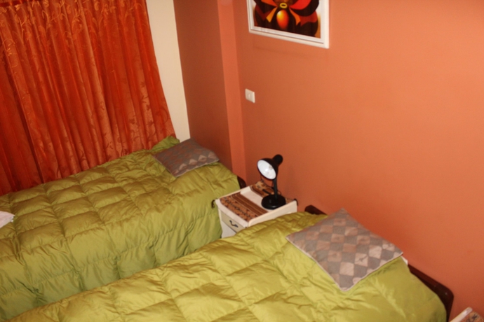 Imagen de la habitación del Hotel Suite Independencia Puno. Foto 17