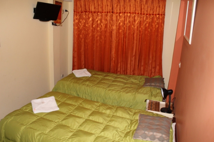 Imagen de la habitación del Hotel Suite Independencia Puno. Foto 18