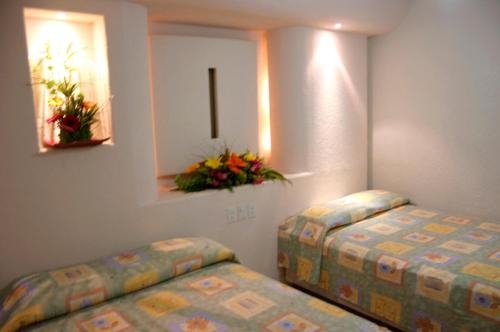 Imagen de la habitación del Hotel Suite Jazmin. Foto 7