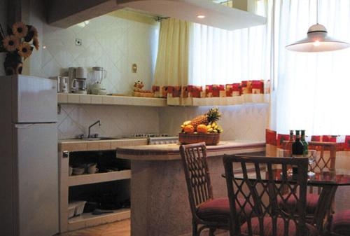 Imagen de la habitación del Hotel Suite Jazmin. Foto 10