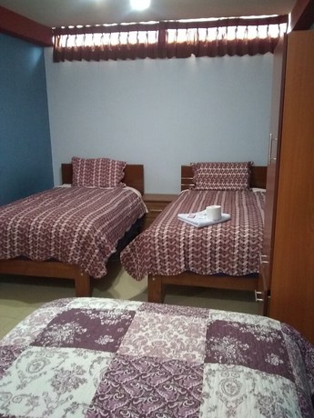 Imagen de la habitación del Hotel Suite Juliaca. Foto 5