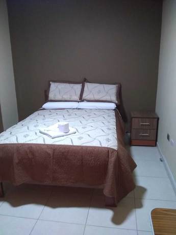 Imagen de la habitación del Hotel Suite Juliaca. Foto 7