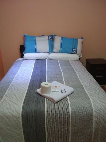 Imagen de la habitación del Hotel Suite Juliaca. Foto 9