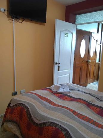 Imagen de la habitación del Hotel Suite Juliaca. Foto 15