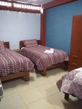 Imagen de la habitación del Hotel Suite Juliaca. Foto 17