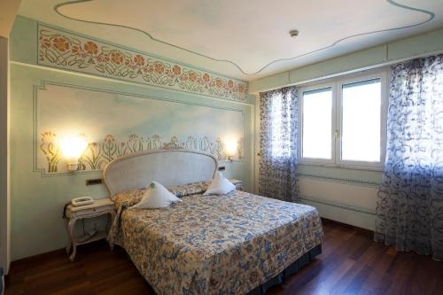 Imagen de la habitación del Hotel Suite Nettuno. Foto 9
