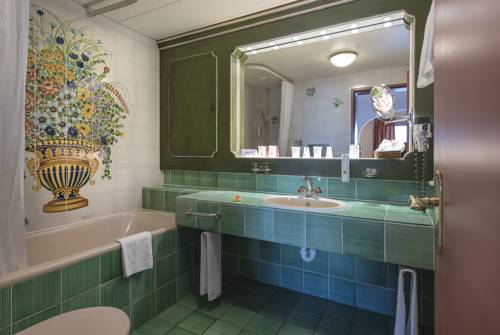 Imagen de la habitación del Hotel Suite Sunstar Brissago. Foto 13