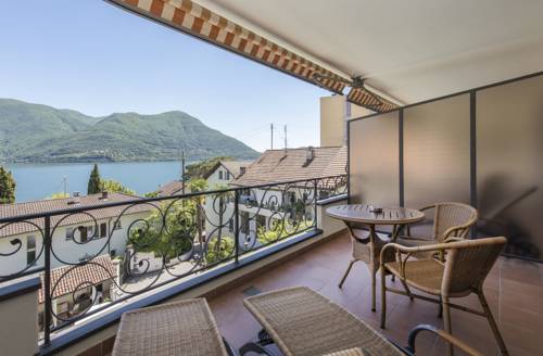 Imagen de la habitación del Hotel Suite Sunstar Brissago. Foto 14