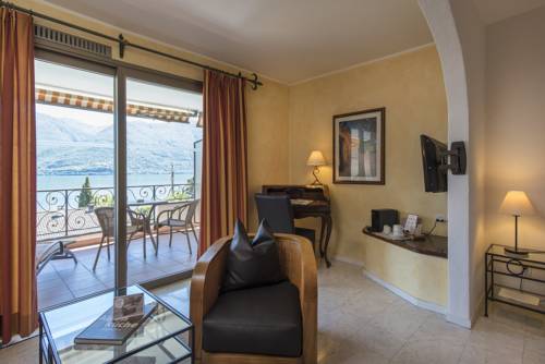 Imagen de la habitación del Hotel Suite Sunstar Brissago. Foto 15