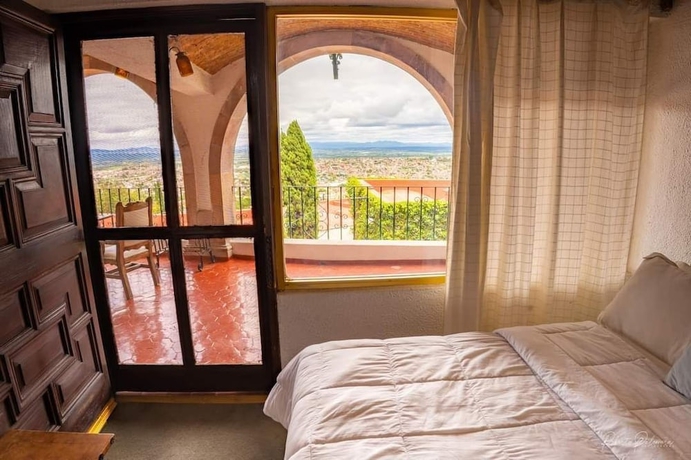 Imagen de la habitación del Hotel Suite vista hermosa. Foto 3