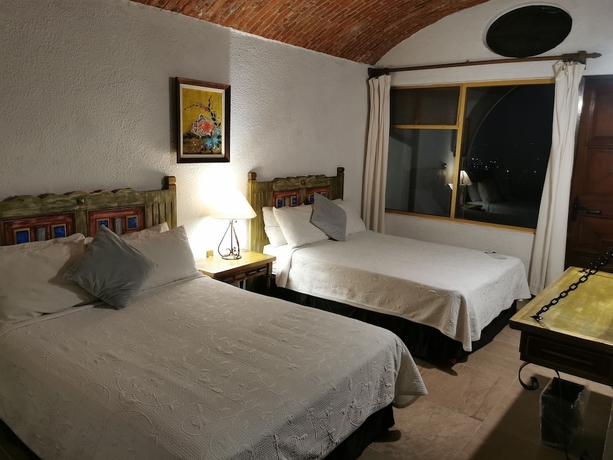 Imagen de la habitación del Hotel Suite vista hermosa. Foto 6