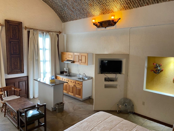 Imagen de la habitación del Hotel Suite vista hermosa. Foto 7