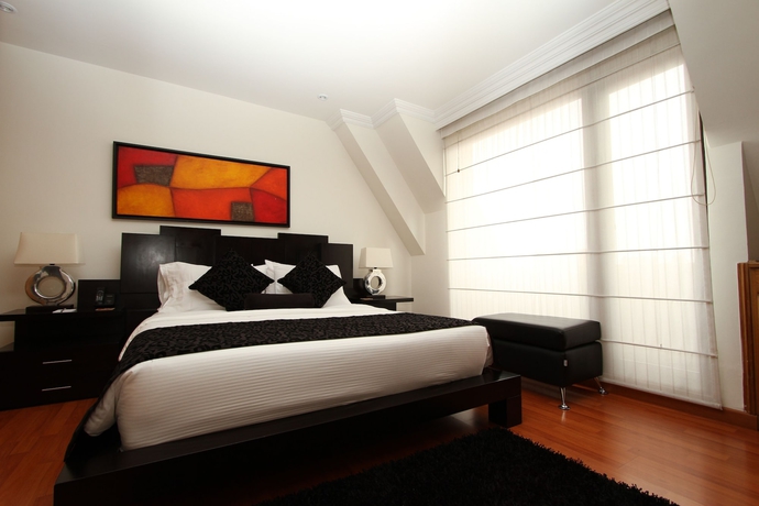 Imagen de la habitación del Hotel Suites 108. Foto 11