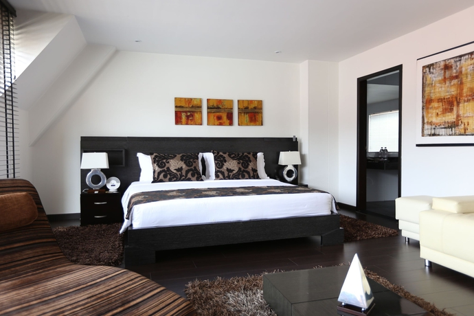 Imagen de la habitación del Hotel Suites 108. Foto 12