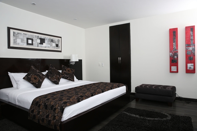 Imagen de la habitación del Hotel Suites 108. Foto 14