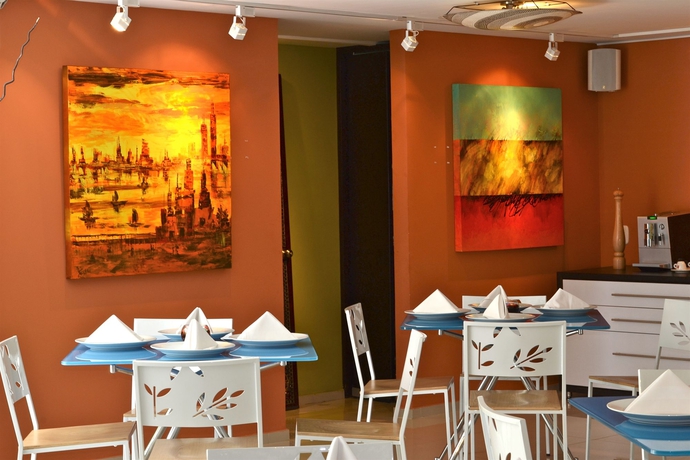 Imagen del bar/restaurante del Hotel Suites 109 Gh Usaquén. Foto 3