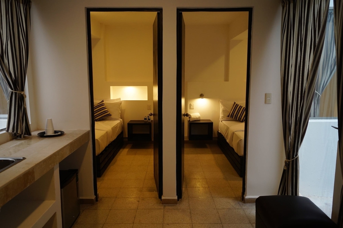 Imagen de la habitación del Hotel Suites 201. Foto 10