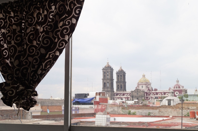 Imagen de la habitación del Hotel Suites 201. Foto 11