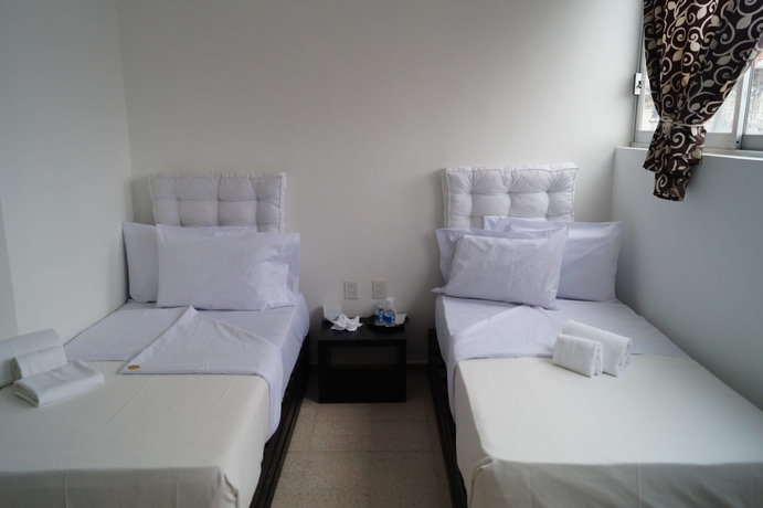 Imagen de la habitación del Hotel Suites 201. Foto 13