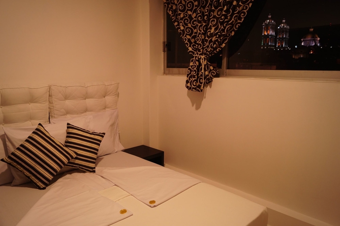 Imagen de la habitación del Hotel Suites 201. Foto 14