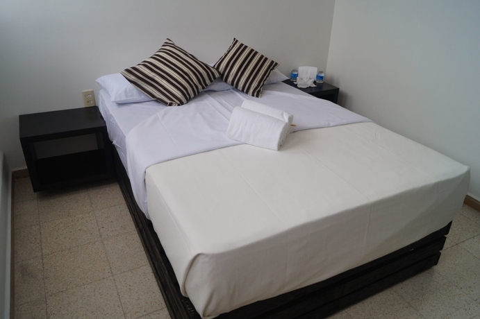 Imagen de la habitación del Hotel Suites 201. Foto 16