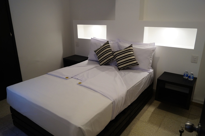 Imagen de la habitación del Hotel Suites 201. Foto 18