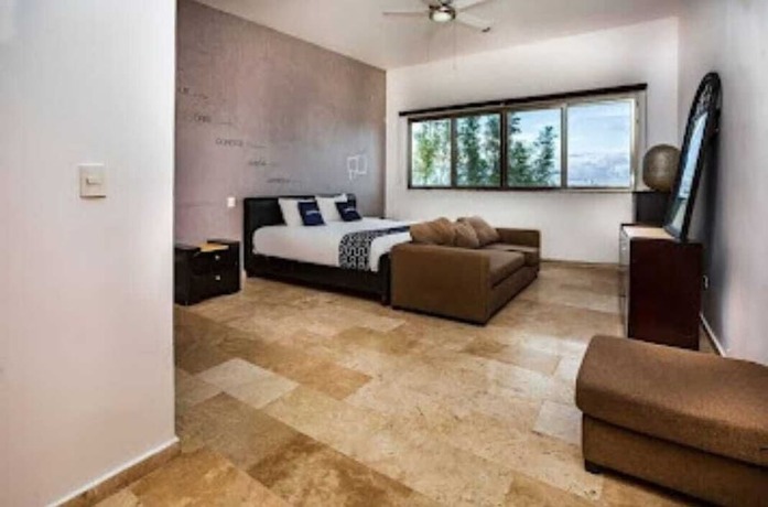 Imagen de la habitación del Hotel Suites Aeropuerto Cancun. Foto 9