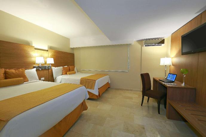 Imagen de la habitación del Hotel Suites Ambassador. Foto 3