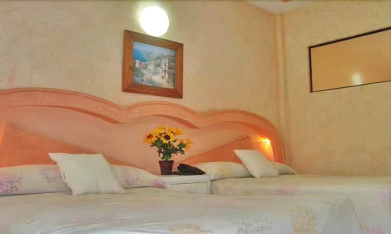 Imagen de la habitación del Hotel Suites Angelopolis. Foto 2