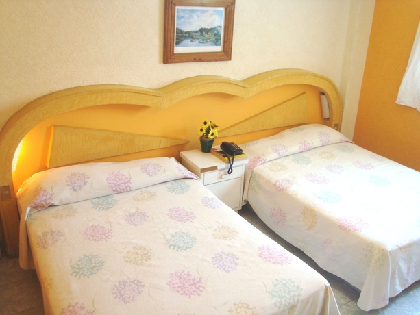 Imagen de la habitación del Hotel Suites Angelopolis. Foto 5