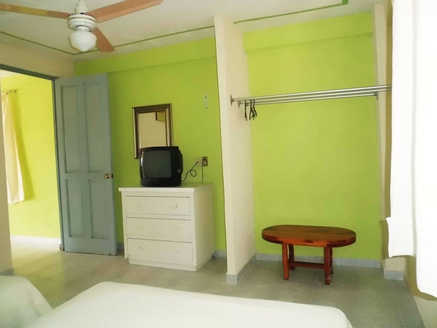Imagen de la habitación del Hotel Suites Angelopolis. Foto 9