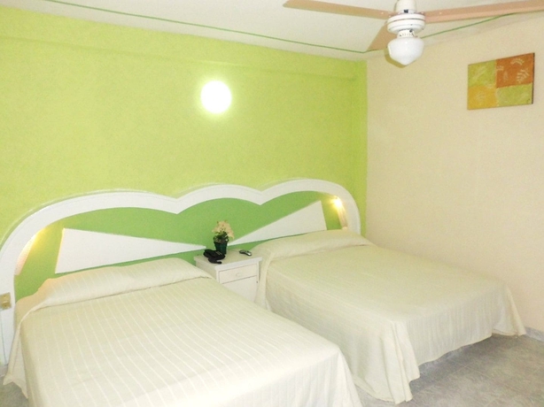 Imagen de la habitación del Hotel Suites Angelopolis. Foto 10