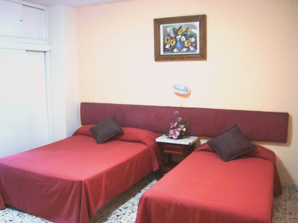 Imagen de la habitación del Hotel Suites Angelopolis. Foto 11