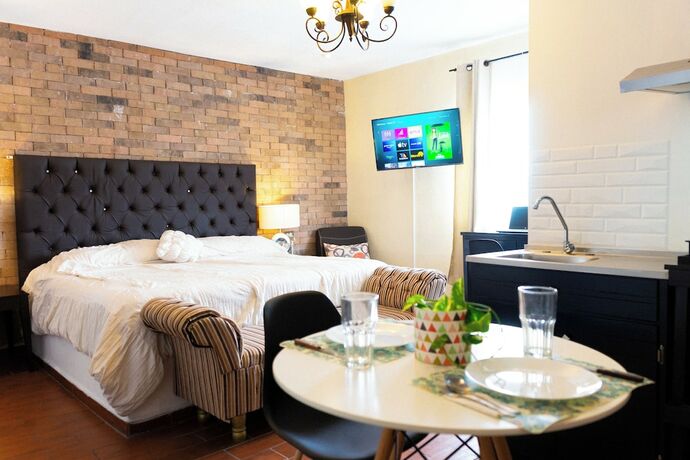 Imagen de la habitación del Hotel Suites Apodaca. Foto 18