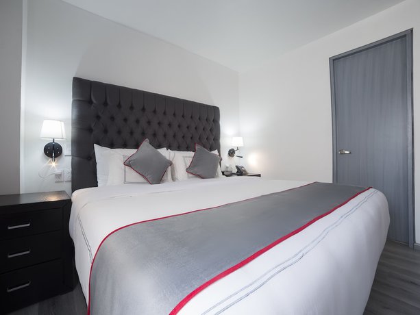 Imagen de la habitación del Hotel Suites Arboleda 215. Foto 2