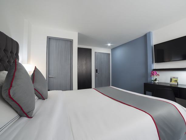 Imagen de la habitación del Hotel Suites Arboleda 215. Foto 4